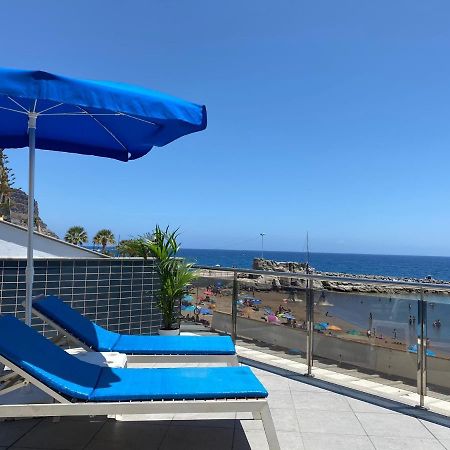 Billy'S Beachfront Apartment With Pool Access بويرتو دي موغان المظهر الخارجي الصورة