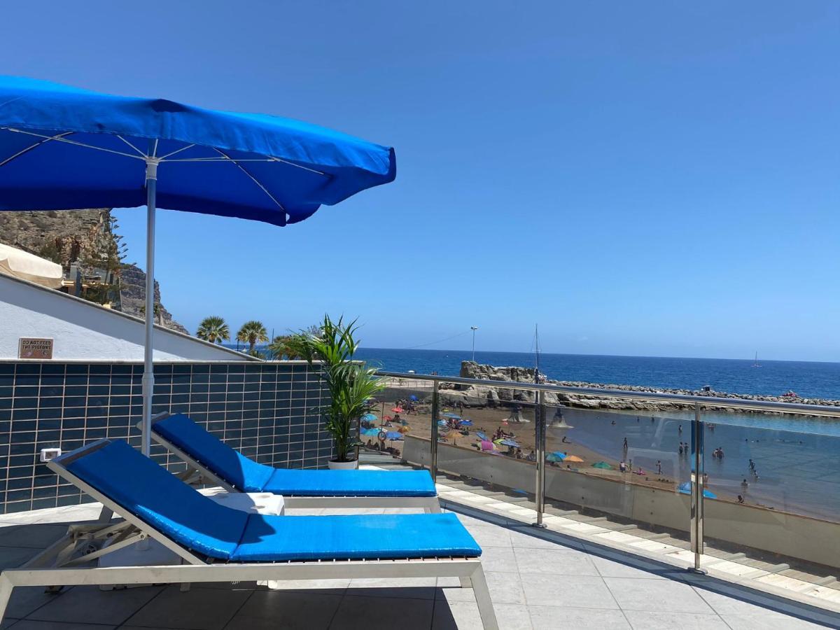 Billy'S Beachfront Apartment With Pool Access بويرتو دي موغان المظهر الخارجي الصورة